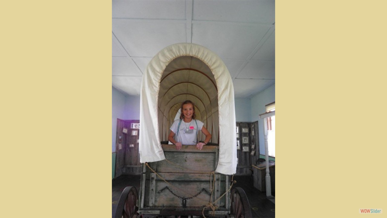 Abby in covered wagon