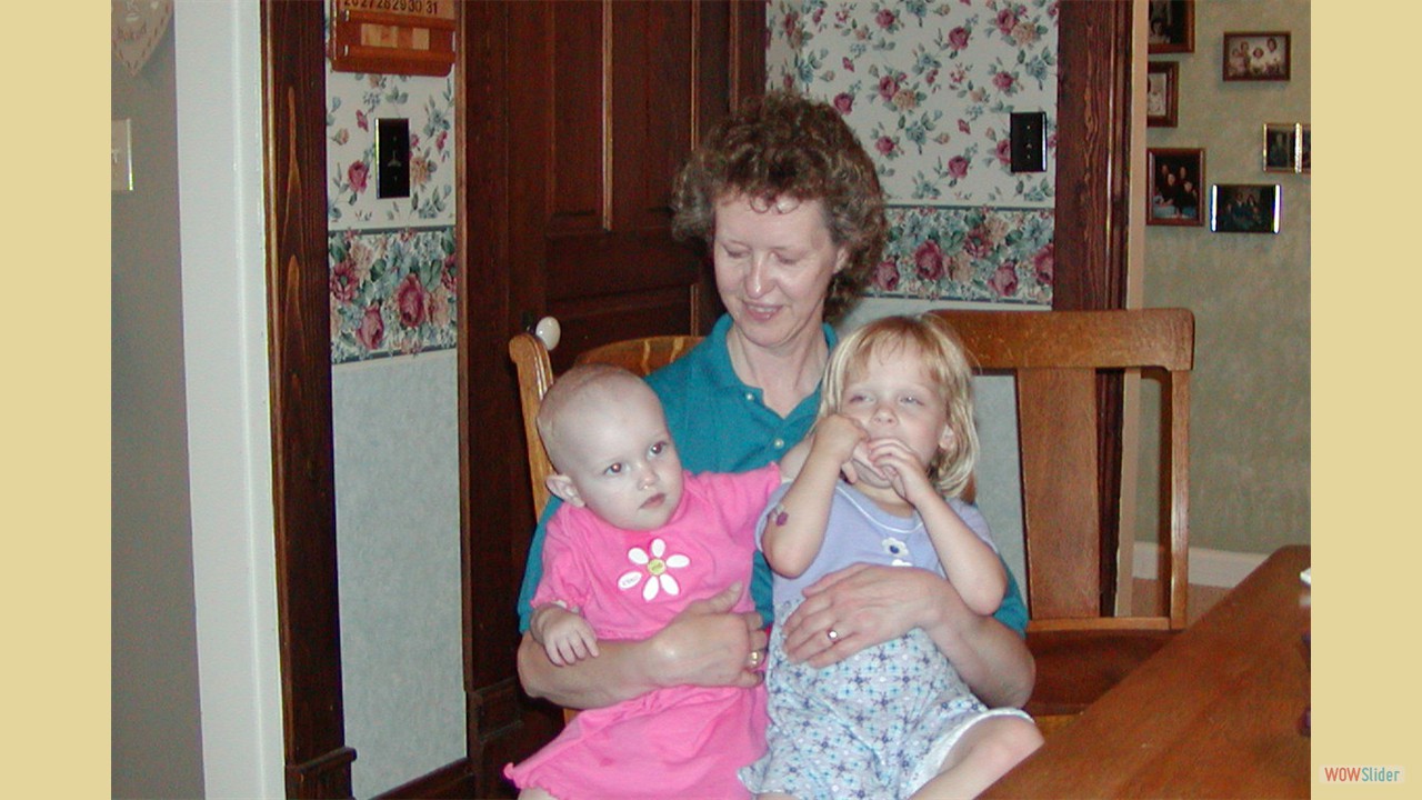 Abby, Kathy, Shelby sitting on Grandma's lap